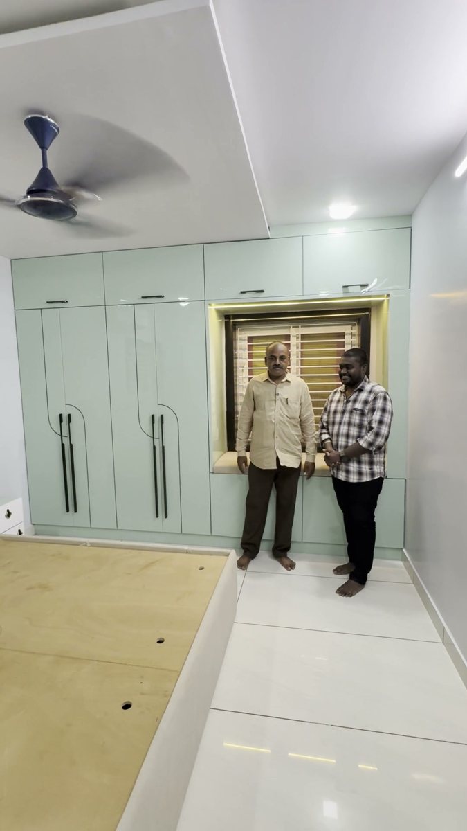 Sudheer with a customer on handover day in Pedapudi